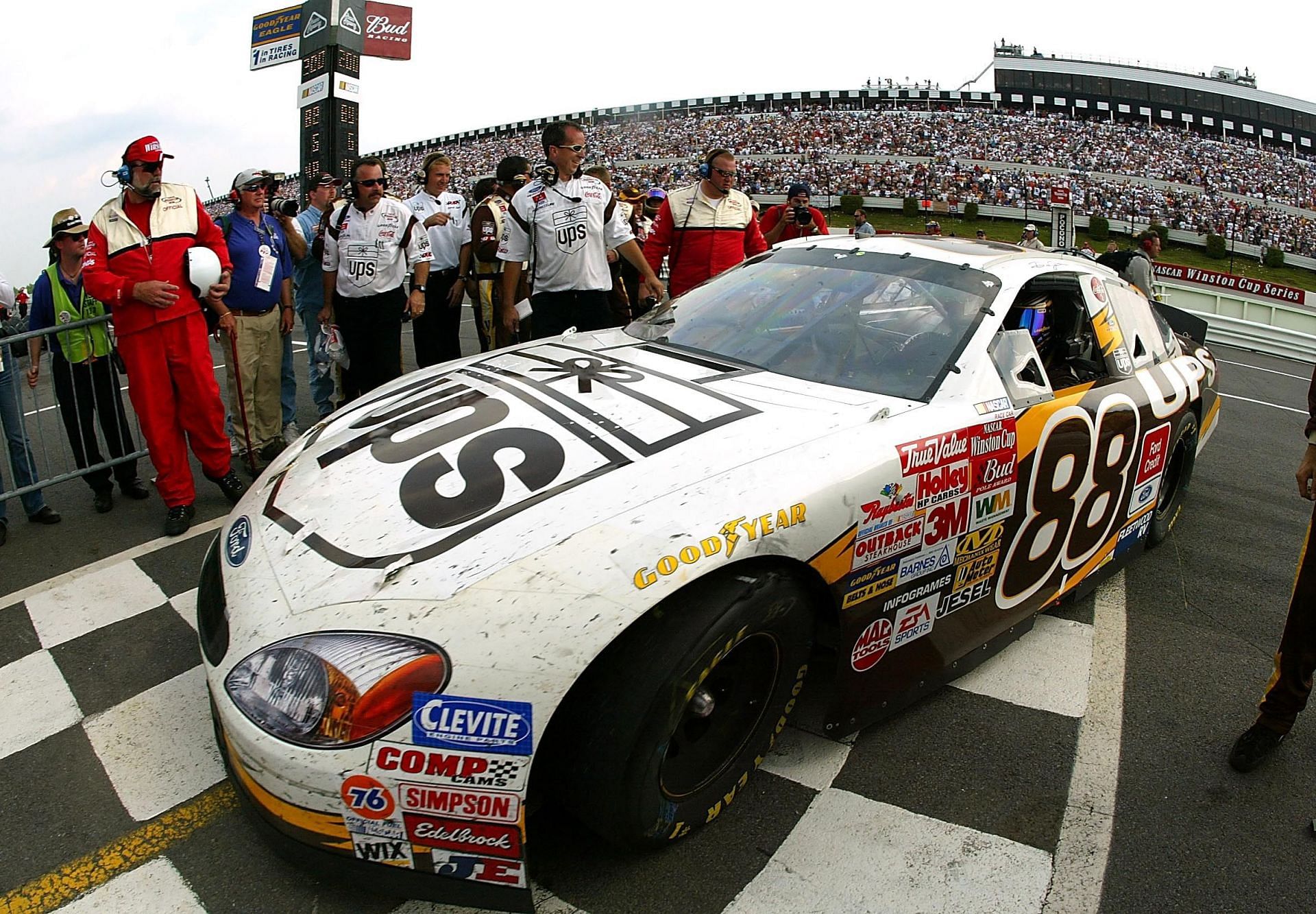 Dale Jarrett, driver of the #88 Robert Yates Racing Ford Taurus, pulls into victory lane after winning the Pocono 500 on June 9, 2002, at Pocono Raceway - Source: Getty